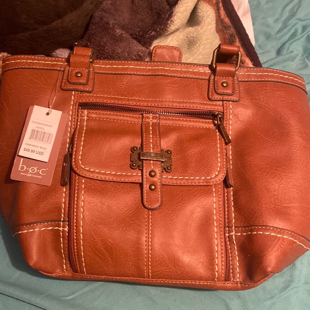 BOC purse new with tags never used! Saddle color.  40.00